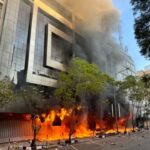 Investigate burning of Uganda House in Kenya